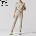 2020 Jiejin Gym Fitness Jogger Pantalones de jogger de color sólido Pantalones de sudor